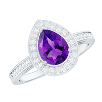 Pear-shaped 1-carat amethyst engagement ring with diamond halo from Rosec Jewels, featuring a silver band and intricate design.