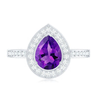 Pear-shaped 1-carat amethyst engagement ring with diamond halo from Rosec Jewels, showcasing the elegant gemstone and intricate design.