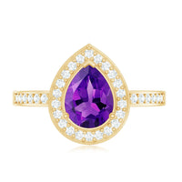 Pear-shaped 1 carat amethyst engagement ring with diamond halo, featuring rose gold setting from Rosec Jewels.