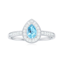 Natural pear-shaped aquamarine teardrop engagement ring with diamond halo from Rosec Jewels, showcasing the elegant gemstone and intricate design.