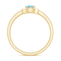 Natural pear-shaped aquamarine engagement ring with diamond halo from Rosec Jewels, showcasing a elegant blue gemstone and sparkling accents.