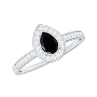 Genuine black spinel teardrop engagement ring with diamond halo from Rosec Jewels, showcasing a sparkling black teardrop center stone and halo design.