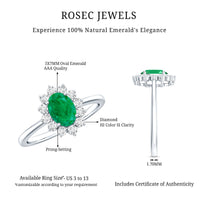 Natural 5x7mm emerald oval engagement ring with diamond halo by Rosec Jewels, featuring a silver band and intricate detailing.
