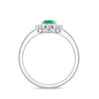 Natural 5x7mm emerald oval engagement ring with diamond halo, showcasing a Rosec Jewels ring on a white background.