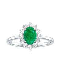Natural 5x7mm emerald oval engagement ring with diamond halo by Rosec Jewels, showcasing a detailed gold band and sparkling accents.
