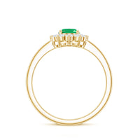 Oval emerald engagement ring with diamond halo, 5x7mm natural gemstone, set in a rose gold band from Rosec Jewels.