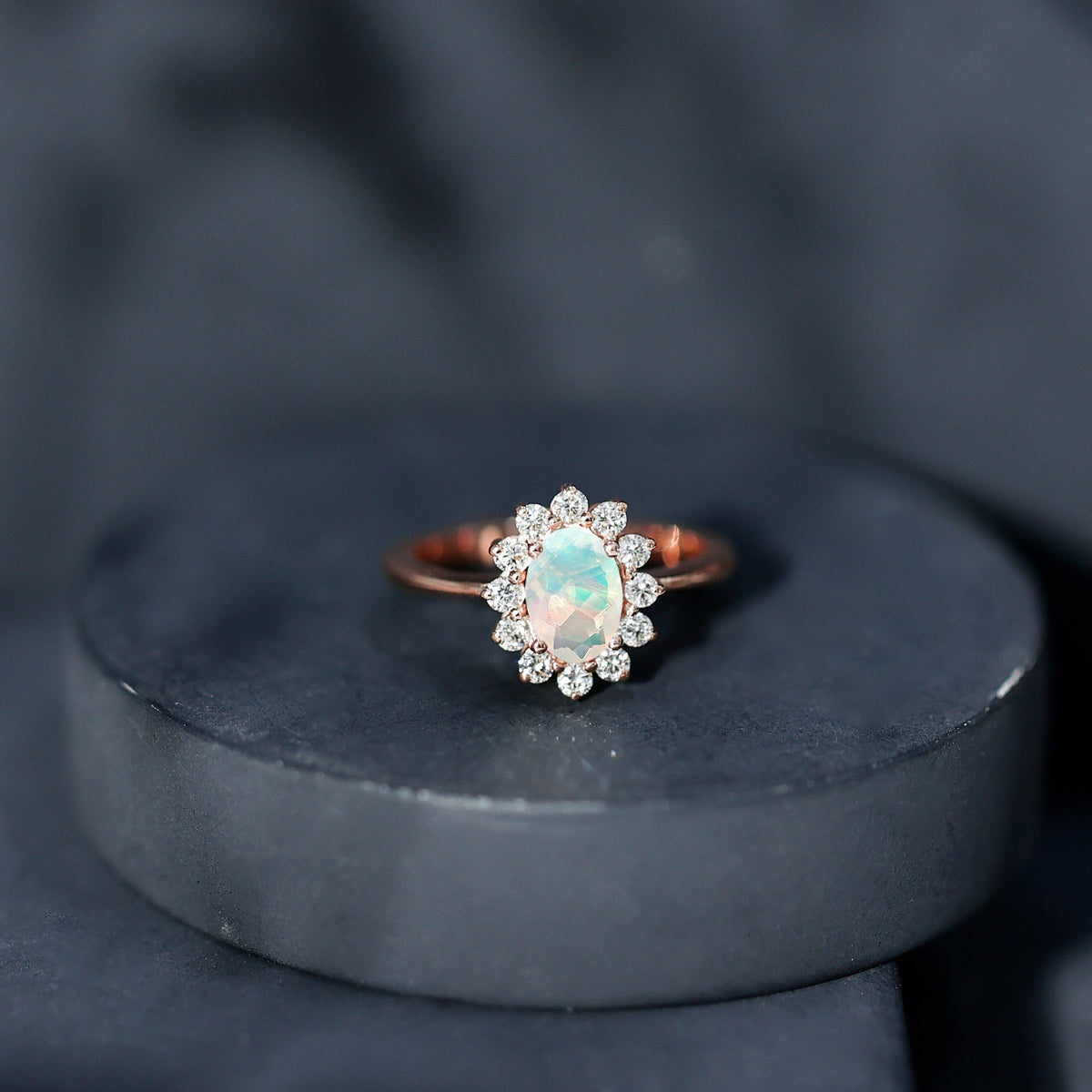 Certified real Ethiopian opal oval engagement ring with diamond halo, featuring elegant rose gold setting from Rosec Jewels.