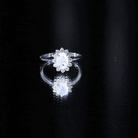 Princess Diana inspired moonstone engagement ring with diamond halo, featuring elegant design from Rosec Jewels.