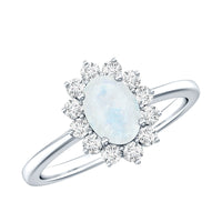 Princess Diana-inspired moonstone engagement ring with diamond halo, featuring a delicate band and elegant design by Rosec Jewels.