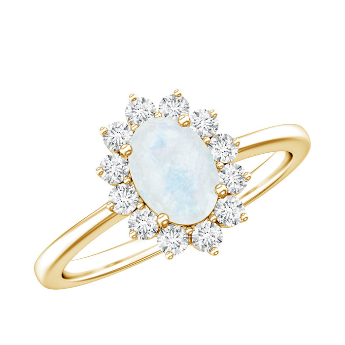 Princess Diana-inspired moonstone engagement ring with diamond halo, featuring a delicate band from Rosec Jewels.