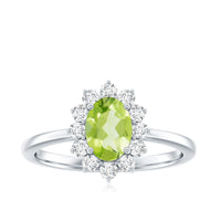 Oval 1-carat peridot engagement ring with diamond halo by Rosec Jewels, featuring a gold band and intricate details.