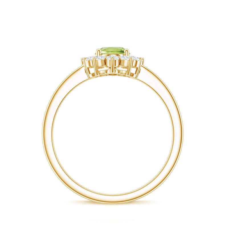 Oval peridot engagement ring with diamond halo, set in rose gold, featuring a 1-carat gemstone and intricate detailing.