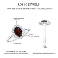 Natural 6x8mm garnet engagement ring with diamond halo by Rosec Jewels, featuring an oblong gemstone setting and intricate band detail.
