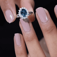 Rosec Jewels 1 Carat London Blue Topaz princess cut engagement ring with diamond accent, inspired by Princess Diana.