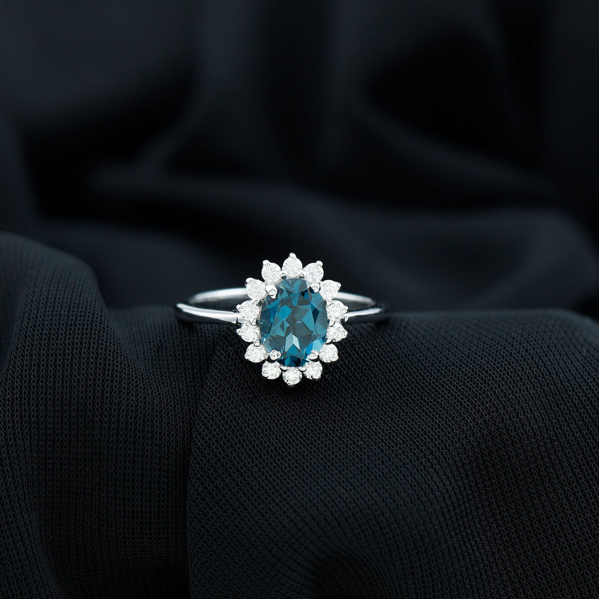 Rosec Jewels 1 Carat London Blue Topaz princess cut engagement ring with diamond, inspired by Princess Diana, featuring intricate band details.