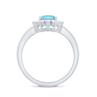 Natural 1 carat aquamarine oval engagement ring with diamond halo by Rosec Jewels, featuring a detailed view of the ring design.
