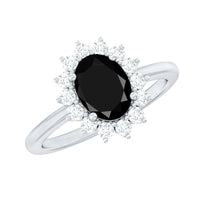 Oval cut black onyx engagement ring with diamond halo, crafted by Rosec Jewels, showcasing a stunning gemstone and intricate design.