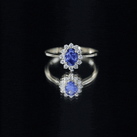 Certified 1 Carat Lab Grown Blue Sapphire Oval Engagement Ring with Diamond Halo