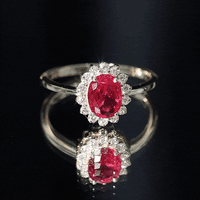 1.5 Carat Oval Shape Lab Grown Ruby and Diamond Halo Engagement Ring