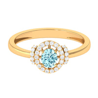 Rosec Jewels 0.50 CT aquamarine halo engagement ring with diamond accent, showcasing a sparkling center stone and intricate band details.