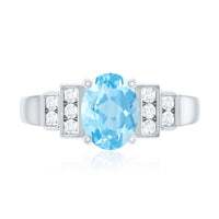 Real 6x8mm aquamarine engagement ring with diamond accents from Rosec Jewels, showcasing the elegant gemstone and detailed band.