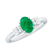 Natural emerald and diamond engagement ring for her featuring a rose gold band with sparkling gemstones by Rosec Jewels.