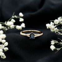 Natural 0.6 carat blue sapphire engagement ring with diamond split shank by Rosec Jewels, showcasing a elegant and minimalist design.