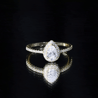 Certified 0.7 Carat Pear Shaped Moissanite Halo Engagement Ring