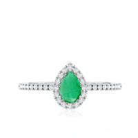 Pear-shaped emerald engagement ring with diamond halo, 0.3 carat, set in a Rosec Jewels ring with intricate detailing.