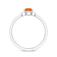 Genuine fire opal teardrop ring with diamond halo from Rosec Jewels, featuring a vibrant orange gemstone and sparkling diamond accents.