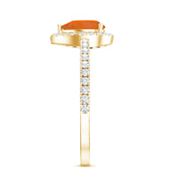 Genuine fire opal teardrop ring with diamond halo by Rosec Jewels, showcasing a vibrant fire opal centerpiece with sparkling diamond accents.
