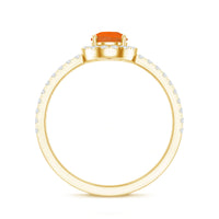 Genuine fire opal teardrop ring with diamond halo, featuring rose gold band and intricate design from Rosec Jewels.