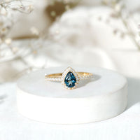 0.7 Carat Pear Shape London Blue Topaz Teardrop Engagement Ring with Moissanite Halo