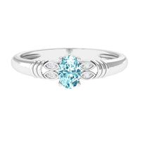 Natural 6x8mm aquamarine oval engagement ring with diamond detail from Rosec Jewels, showcasing the elegant gemstone setting.