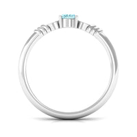 Natural aquamarine oval engagement ring with 6x8mm gemstone and diamond accents, crafted by Rosec Jewels.