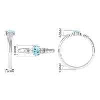 Natural aquamarine oval engagement ring with 6x8mm stone and diamond accents, crafted by Rosec Jewels.