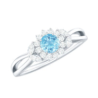 Natural aquamarine flower promise ring with diamond accents from Rosec Jewels, featuring a delicate floral design and sparkling gemstone details.