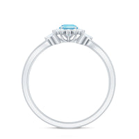 Natural aquamarine flower promise ring with diamond accents by Rosec Jewels, featuring a delicate floral design in sterling silver.