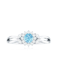 Natural aquamarine flower promise ring with diamond by Rosec Jewels, showcasing a delicate aquamarine flower design and sparkling diamond.