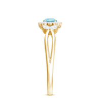 Natural aquamarine flower promise ring with diamond detail by Rosec Jewels, showcasing a delicate floral design in sterling silver.