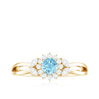 Natural aquamarine flower promise ring with diamond from Rosec Jewels, featuring a detailed floral design and sparkling gemstone accents.