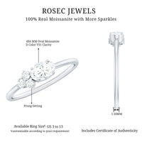 Oval and round moissanite promise ring for her by Rosec Jewels, featuring sparkling gemstones and a polished silver band.