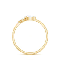 Oval and round moissanite promise ring for her featuring sparkling stones set in a delicate band, by Rosec Jewels.