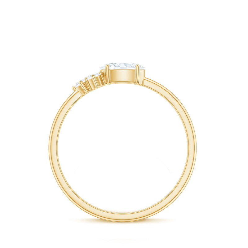 Oval and round moissanite promise ring for her featuring sparkling stones set in a delicate band, by Rosec Jewels.