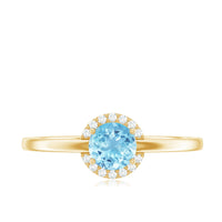 Certified real aquamarine promise ring with diamond halo from Rosec Jewels, showcasing a detailed silver band and vibrant blue gemstone.