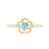 Natural aquamarine and diamond flower promise ring by Rosec Jewels featuring detailed gemstone settings and elegant design.