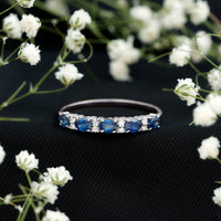 Natural 0.8 Carat Oval Blue Sapphire and Diamond Half Eternity Wedding Band