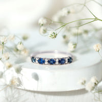 Natural 0.8 Carat Oval Blue Sapphire and Diamond Half Eternity Wedding Band