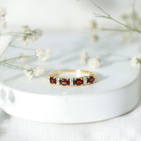 Natural Garnet Eternity Wedding Band in Yellow Gold Plated Silver