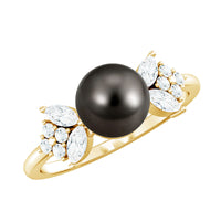 Nature-inspired Tahitian pearl engagement ring with diamond from Rosec Jewels, showcasing a pearl and sparkling diamond detail.